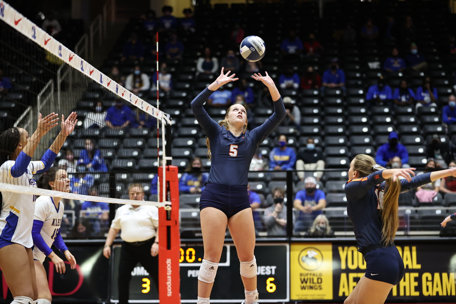 Seven Lakes junior setter Casey Batenhorst places the ball for an attack during the Spartans' Class 6A state championship match over Klein on Dec. 12 at the Culwell Center in Garland.